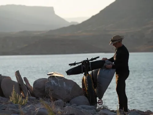Revelate Sweetroll being packed on the bike